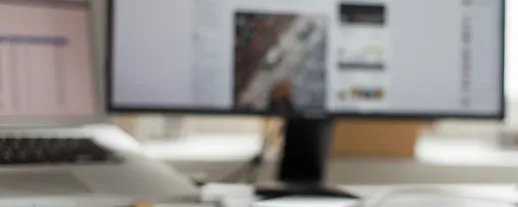 Office with monitors showing route planning software