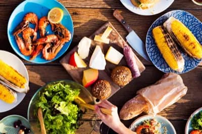 Refrigerated delivery truck at restaurant loading dock